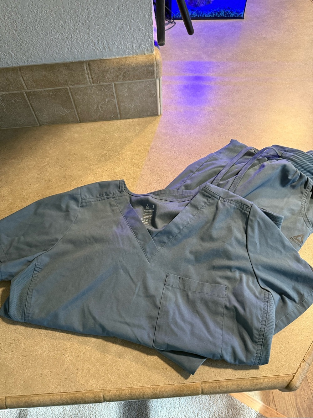 Reebok Slate Blue scrubs for women in small.